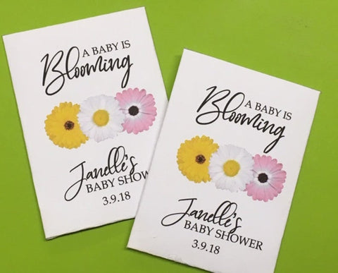 pink and yellow baby shower seed packets favors