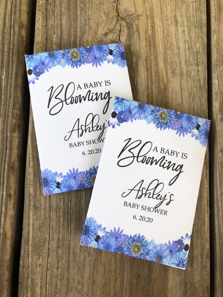 purple or blue daisy baby shower seed packets favors